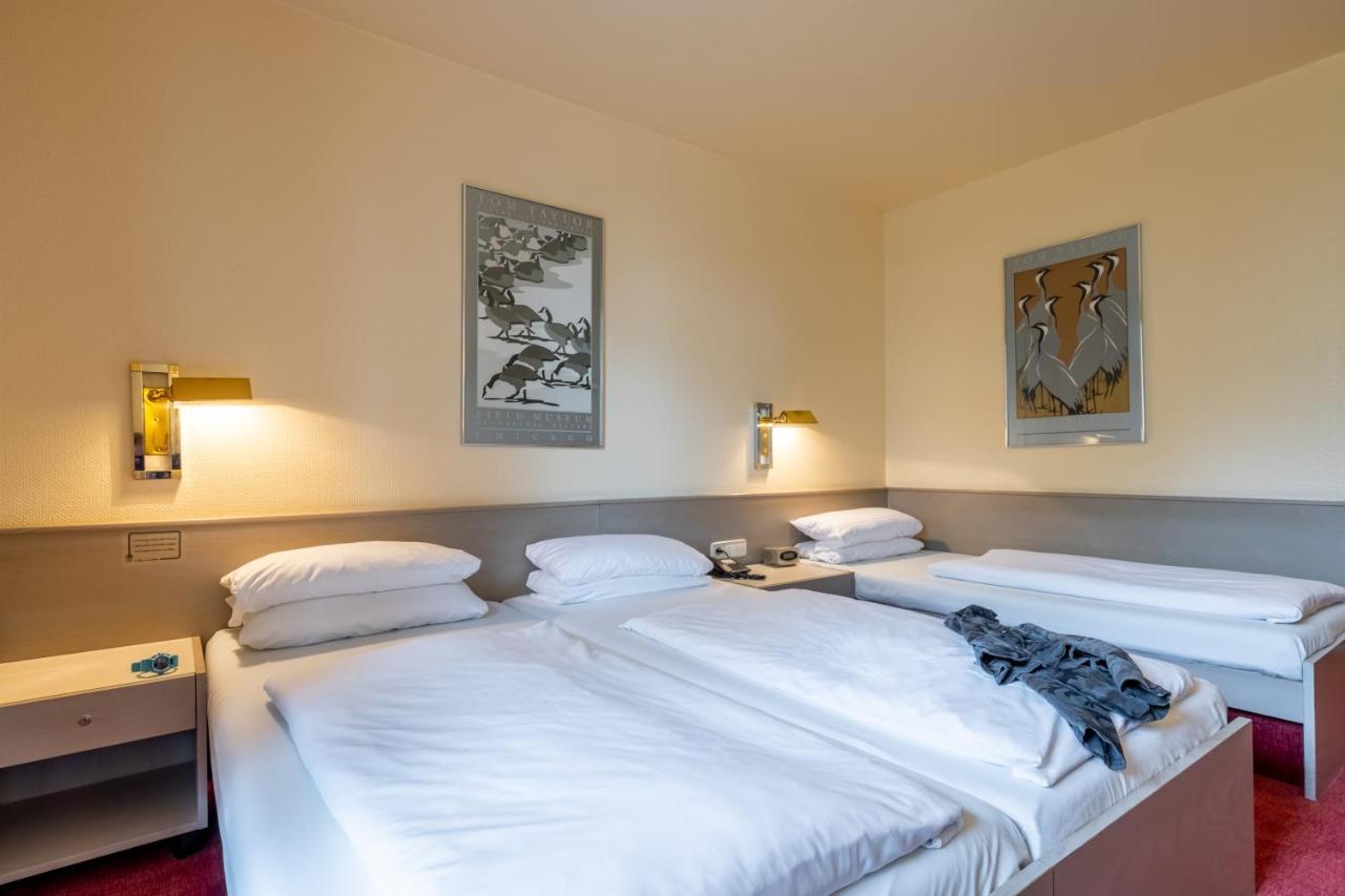 Dreibettzimmer