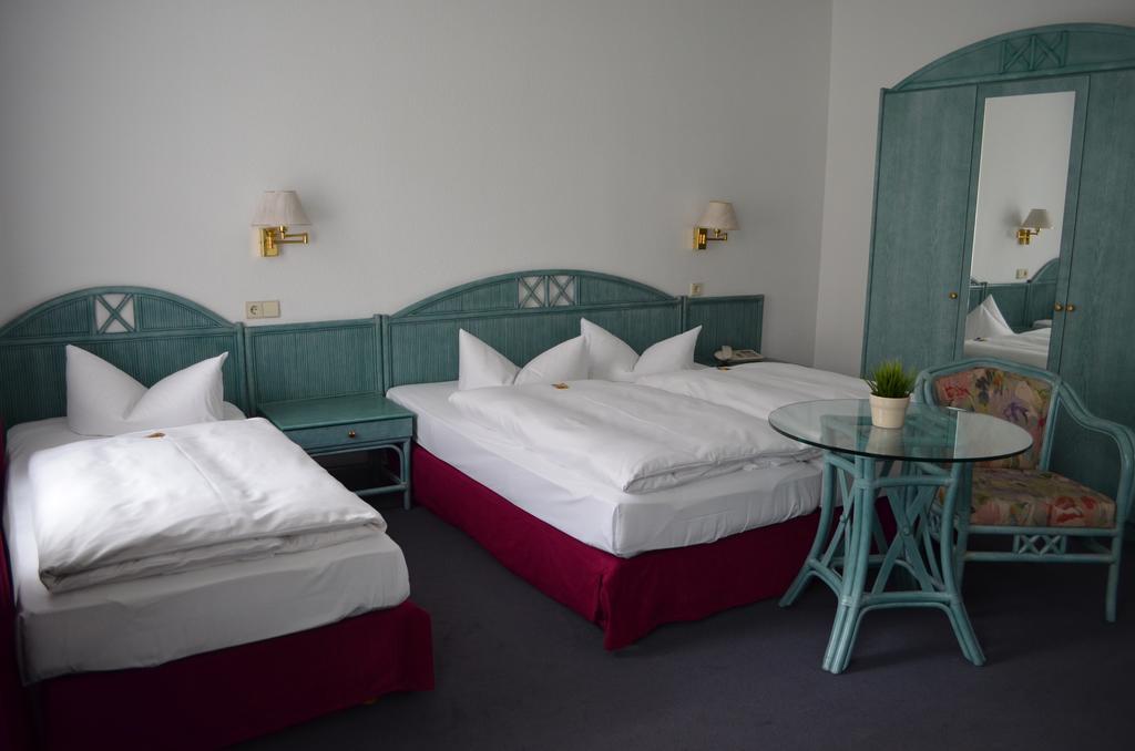 Dreibettzimmer