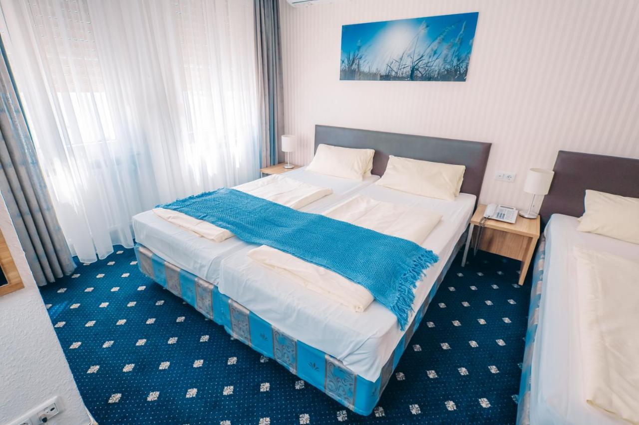 Dreibettzimmer