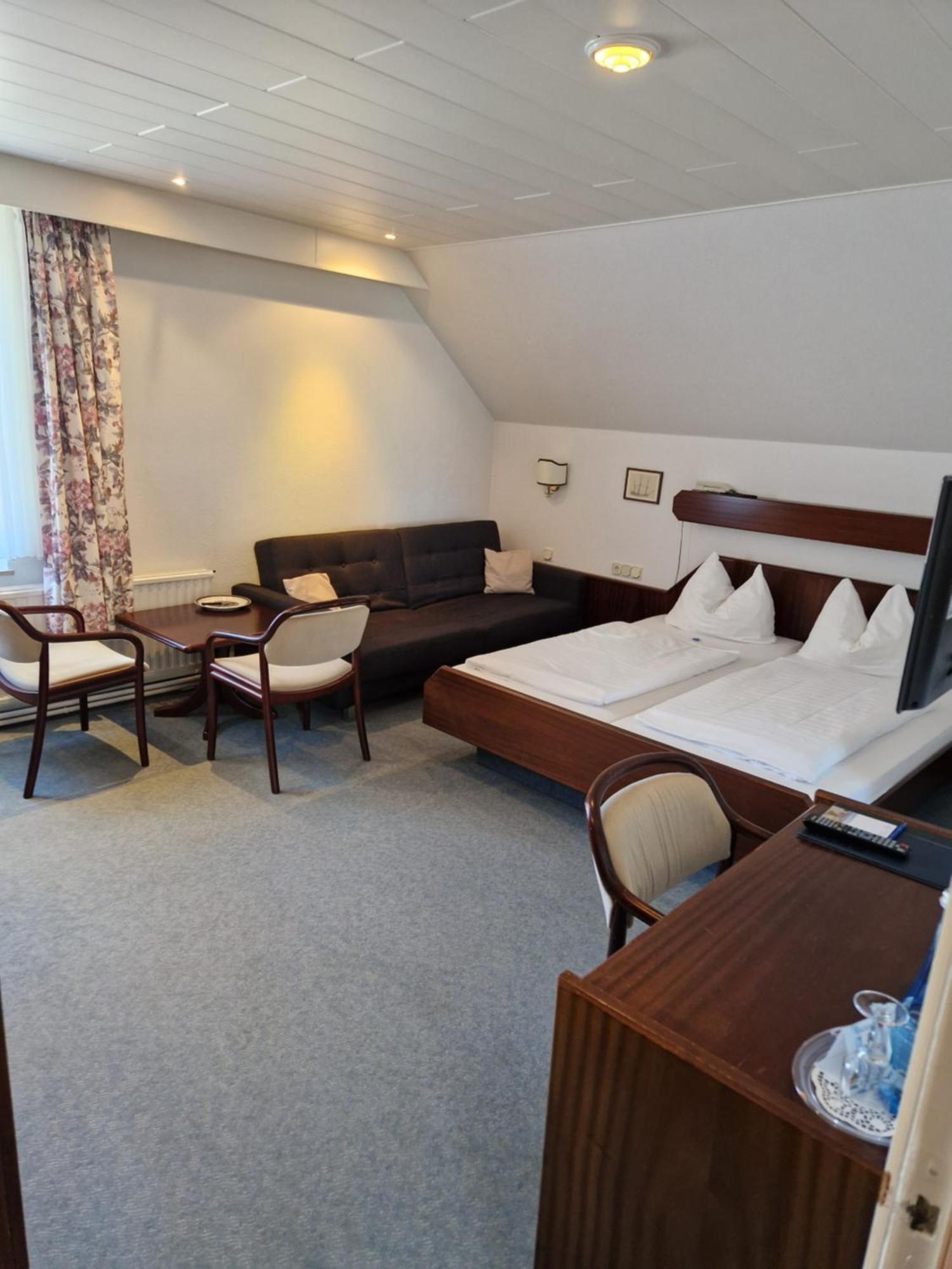 Doppelzimmer mit 1 Schlafsofa (3 Erwachsene)