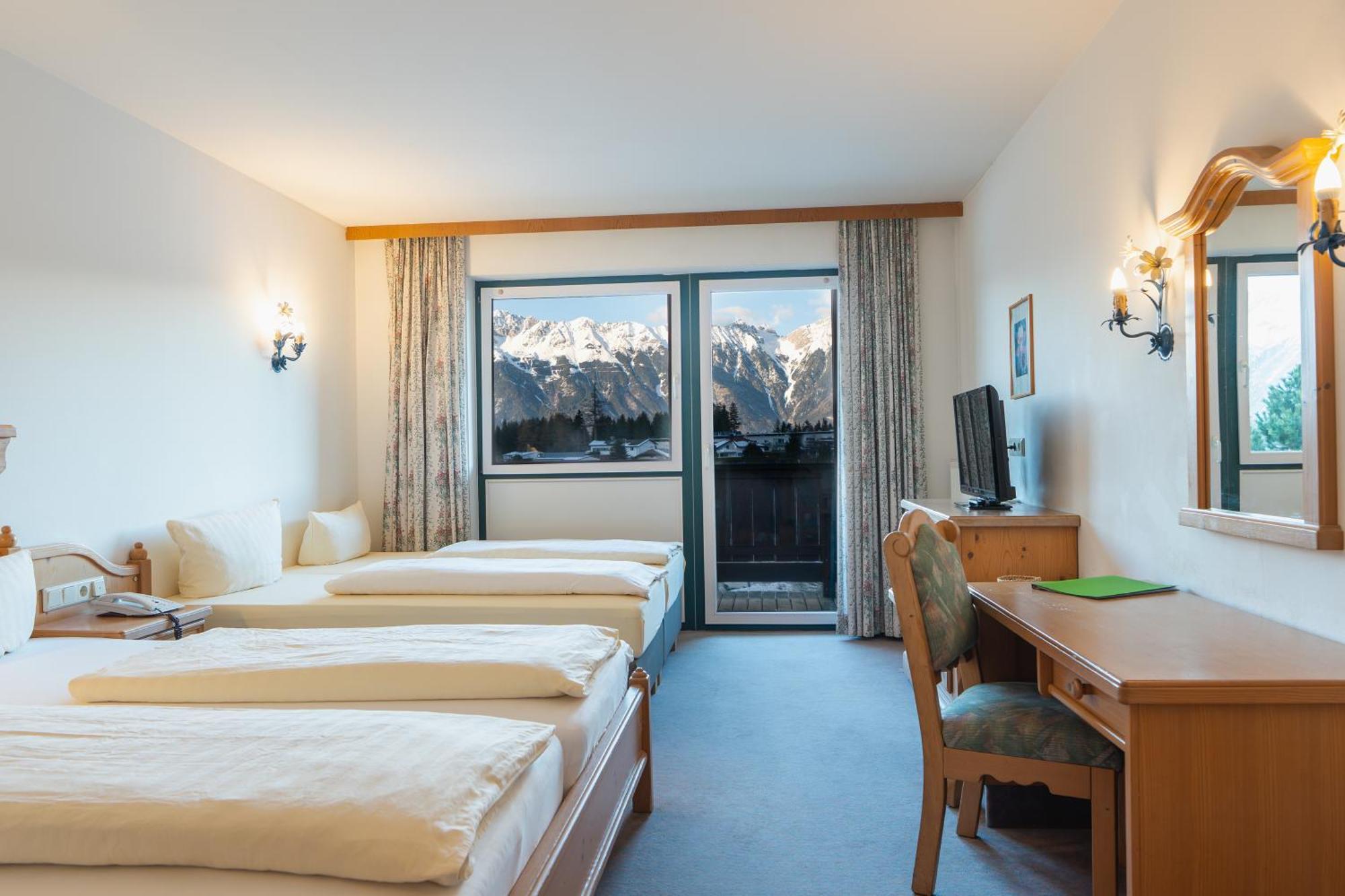 Vierbettzimmer mit Bergblick