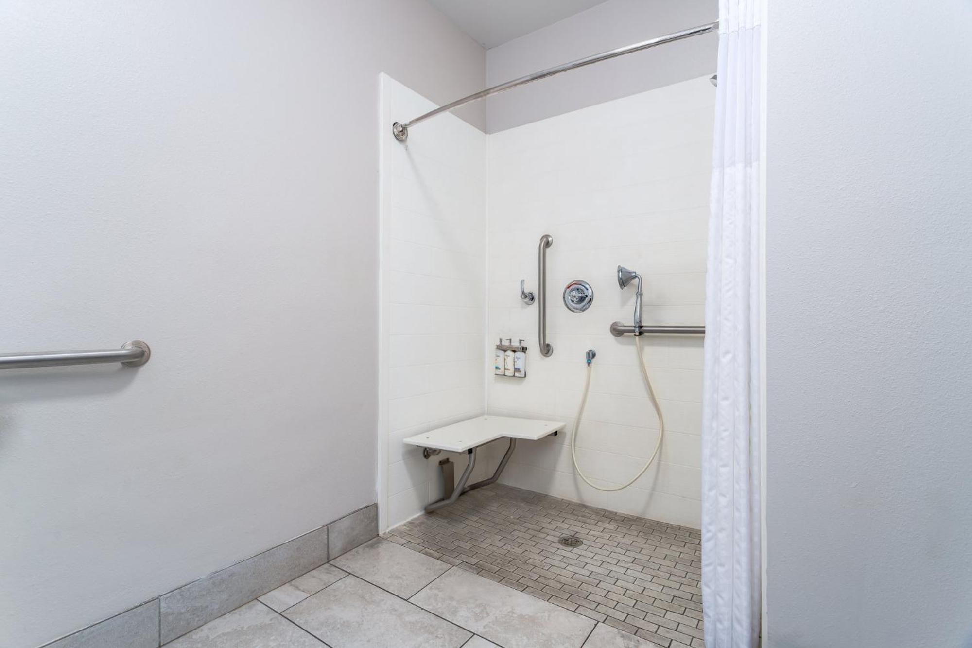 Standard King Room Roll Shower Mobility Accessible