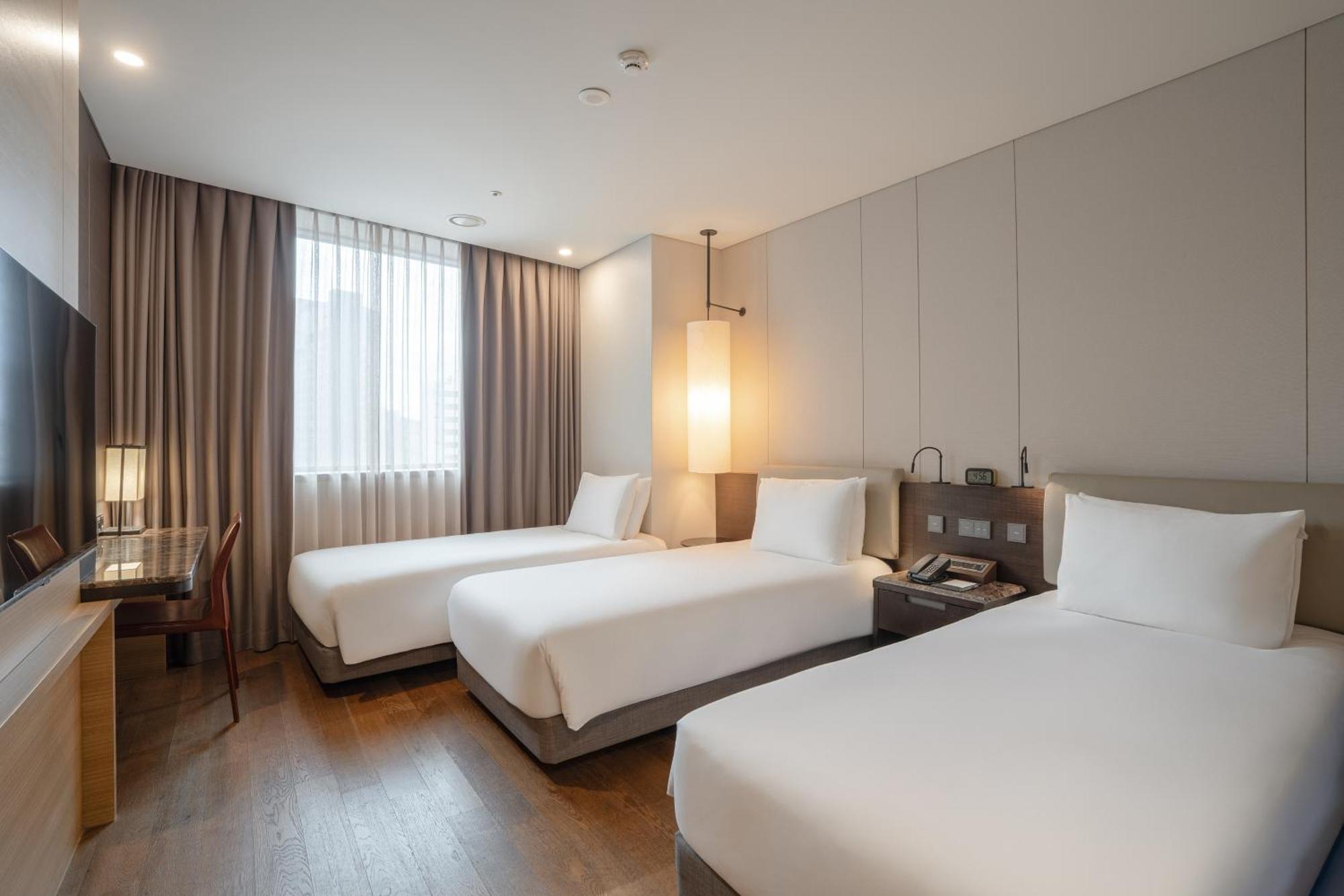 Deluxe Dreibettzimmer