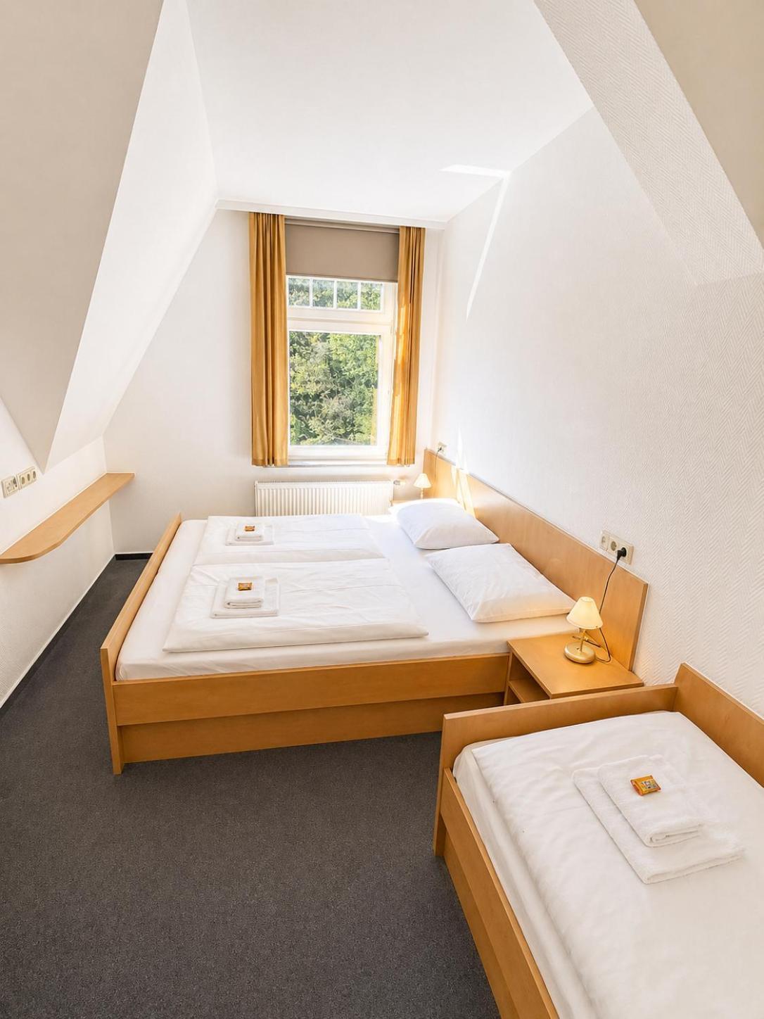 Dreibettzimmer