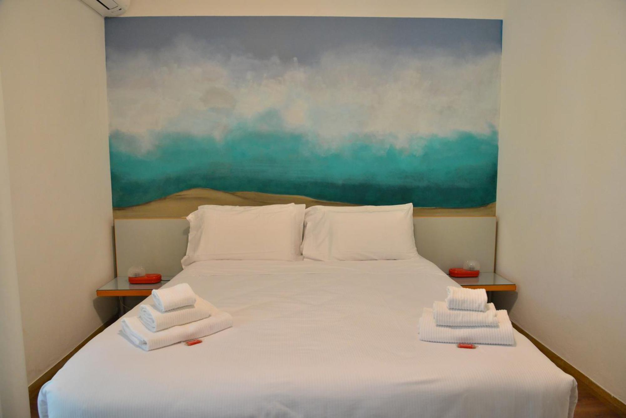 Comfort Doppel-/Zweibettzimmer mit Terrasse und seitlichem Seeblick