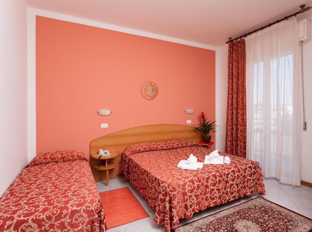 Dreibettzimmer mit Balkon