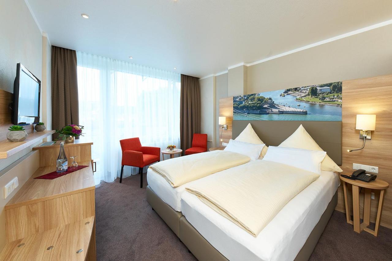 Doppelzimmer mit Flussblick und Balkon
