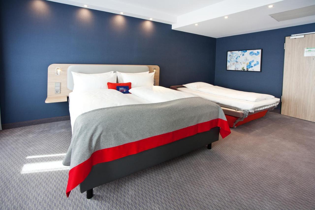 Standard Zimmer mit Queensize-Bett und Einzelschlafsofa