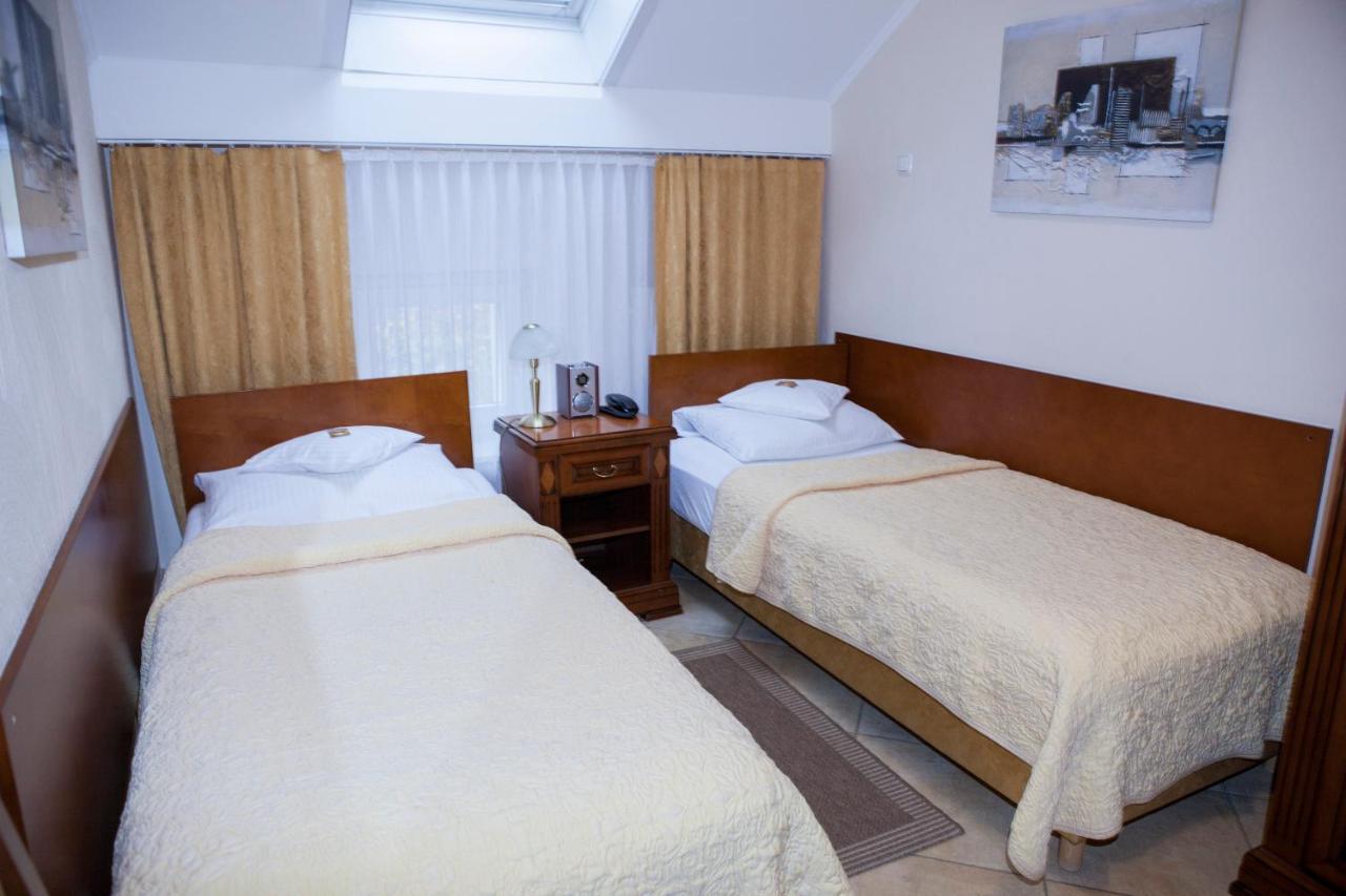 Doppel- oder Zweibettzimmer