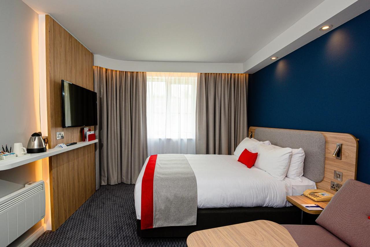 Standard Doppelzimmer mit Einzelschlafsofa und kostenlosem warmen Frühstück