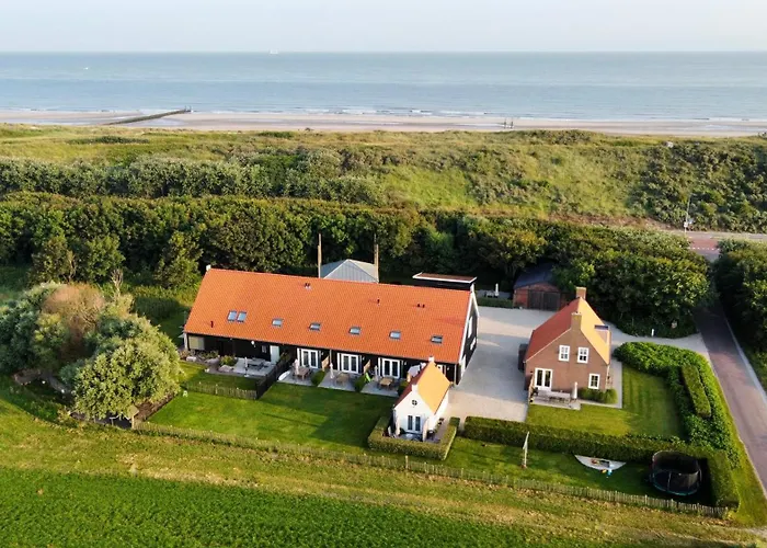 Hotel Am Strand Vakantieverblijf De Trommel